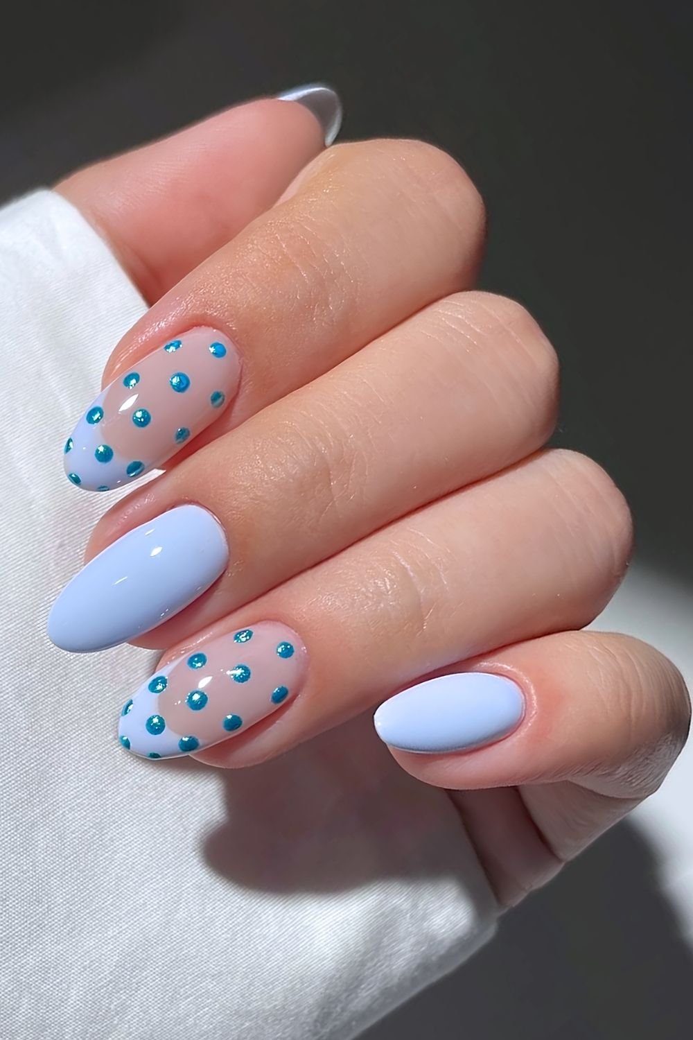 Baby blue with chrome polka dot nails