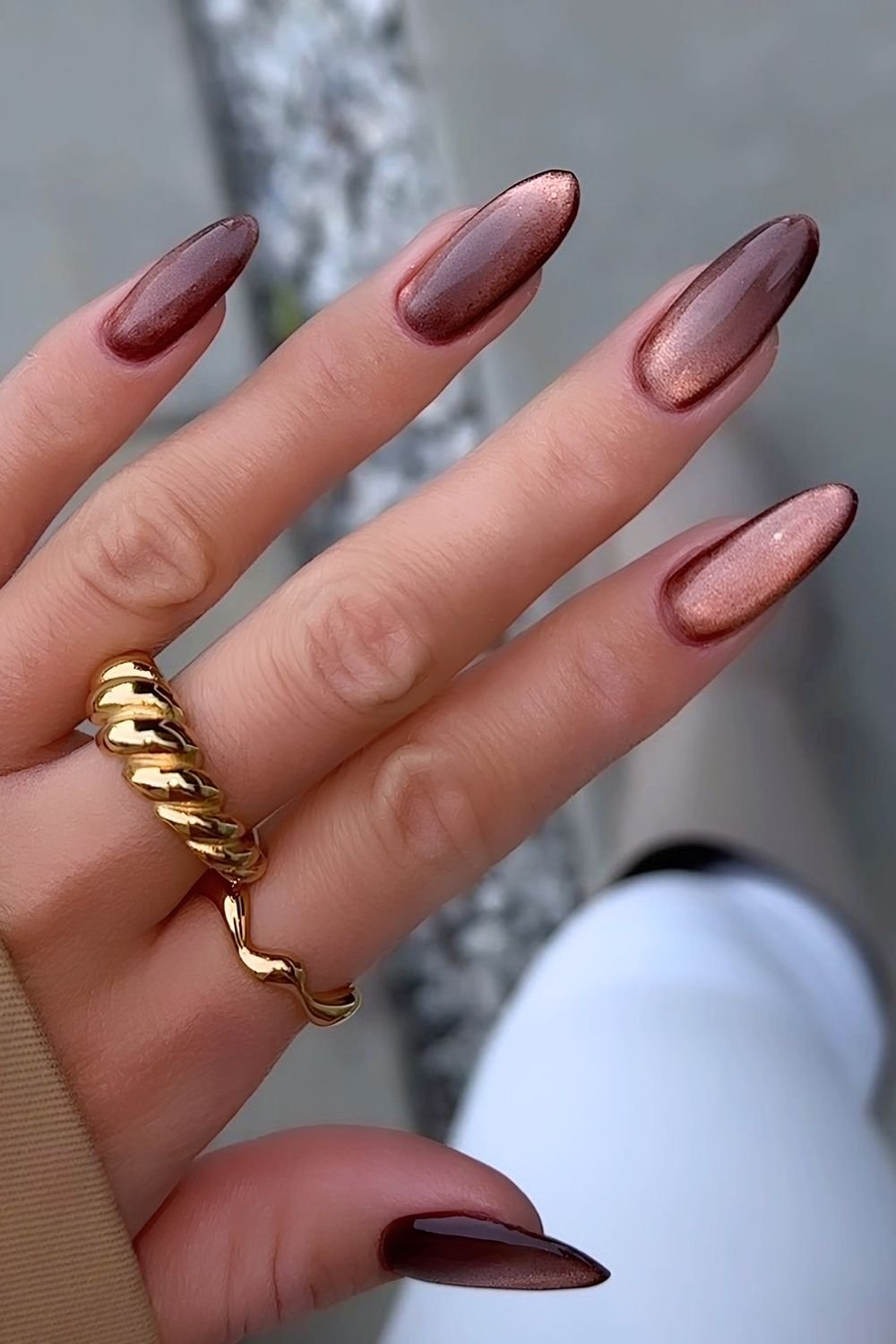 Brown cat eye nails