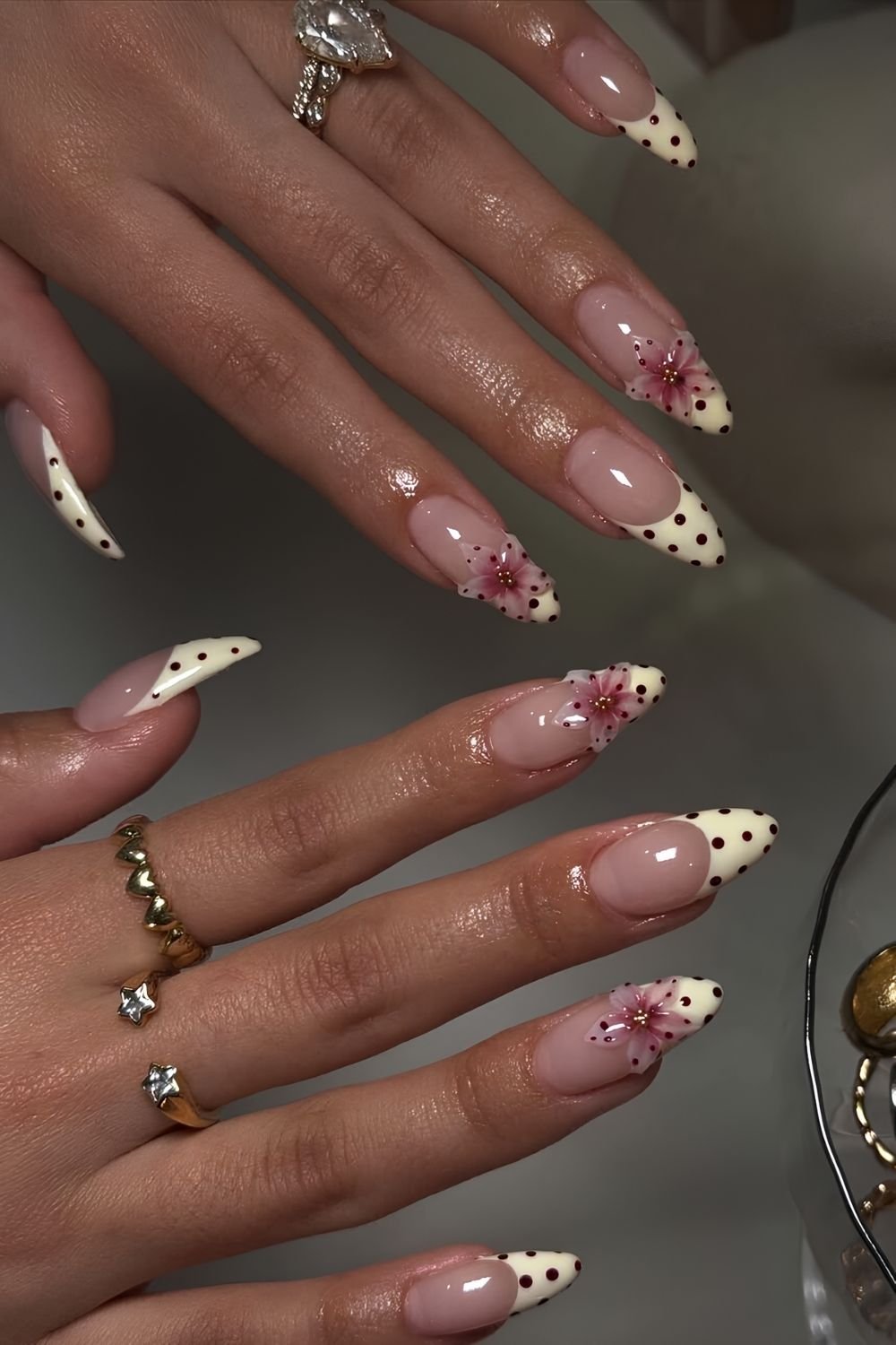 Butter yellow polka dot nails with 3d flower accents