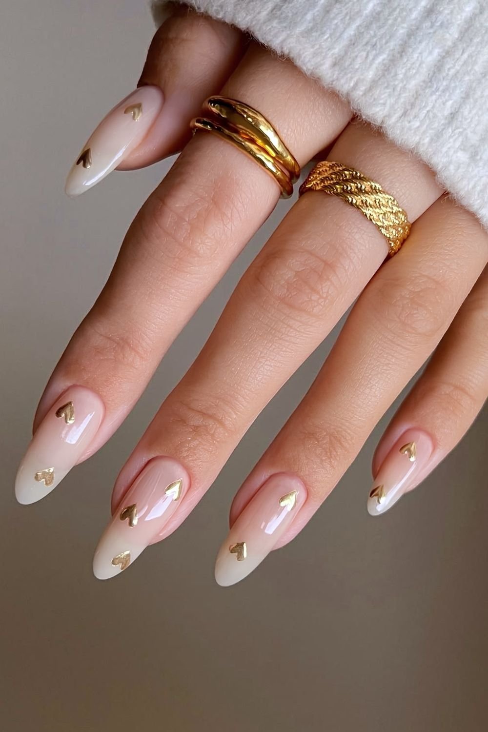 Cloudy white nails with gold chrome hearts