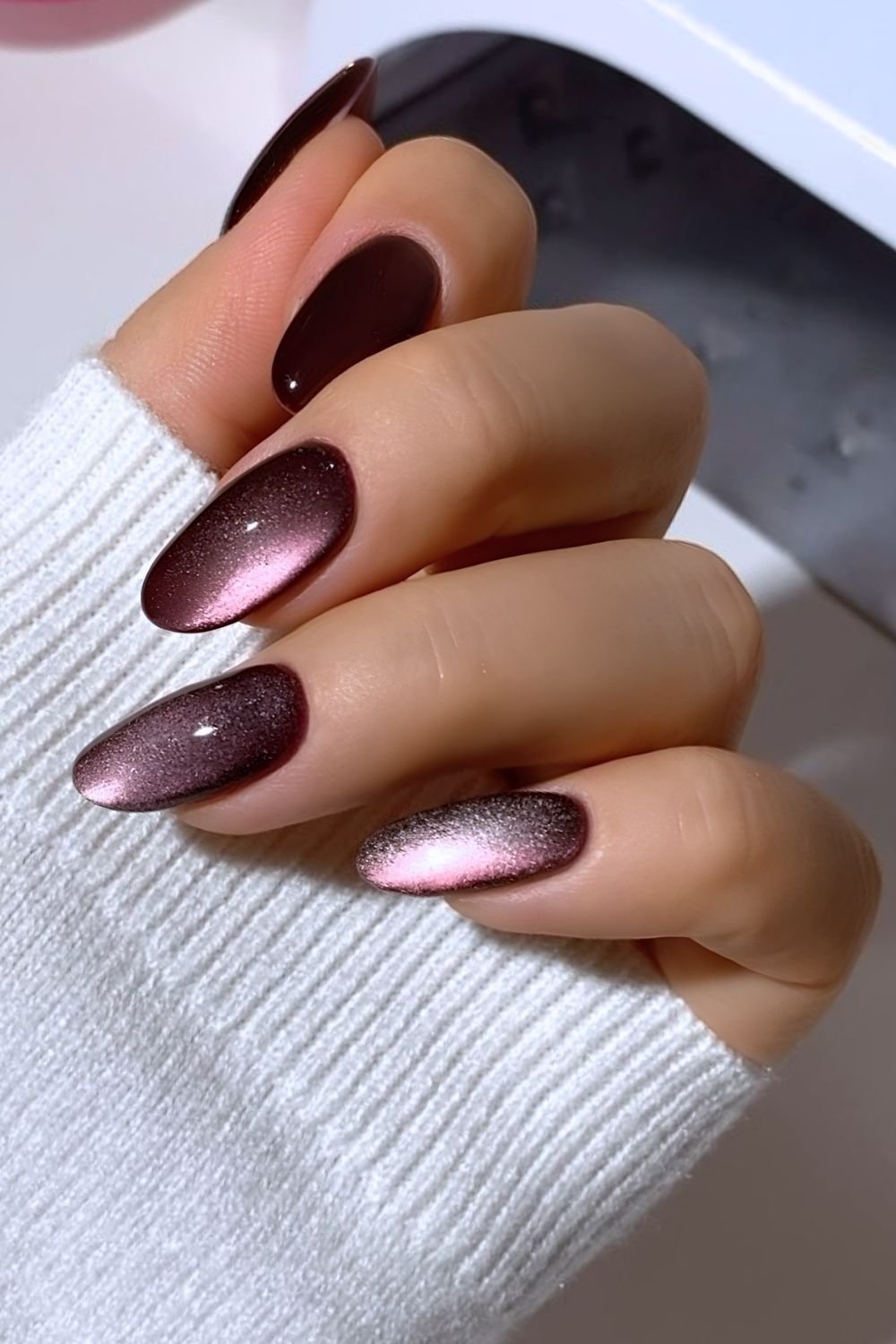 Dark purple cat eye nails