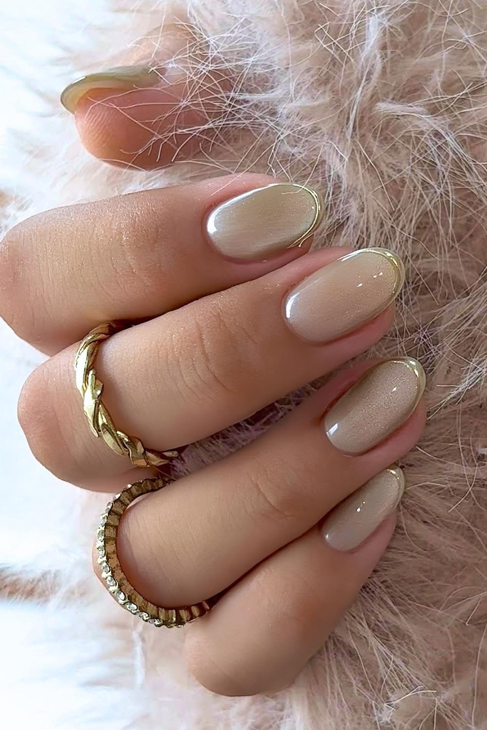 Gold cat eye nails with gold chrome frenchies