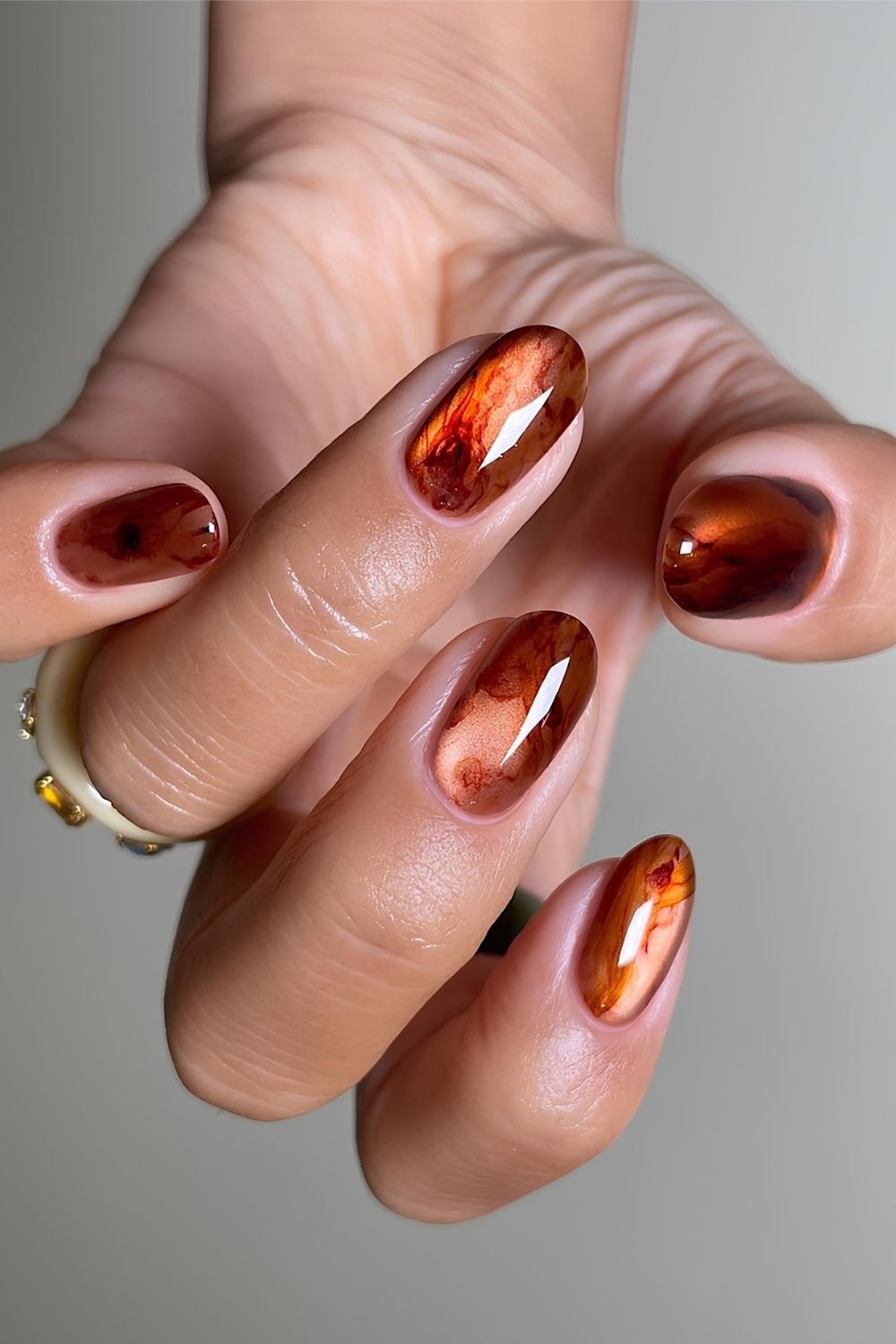 Marble brown cat eye nails