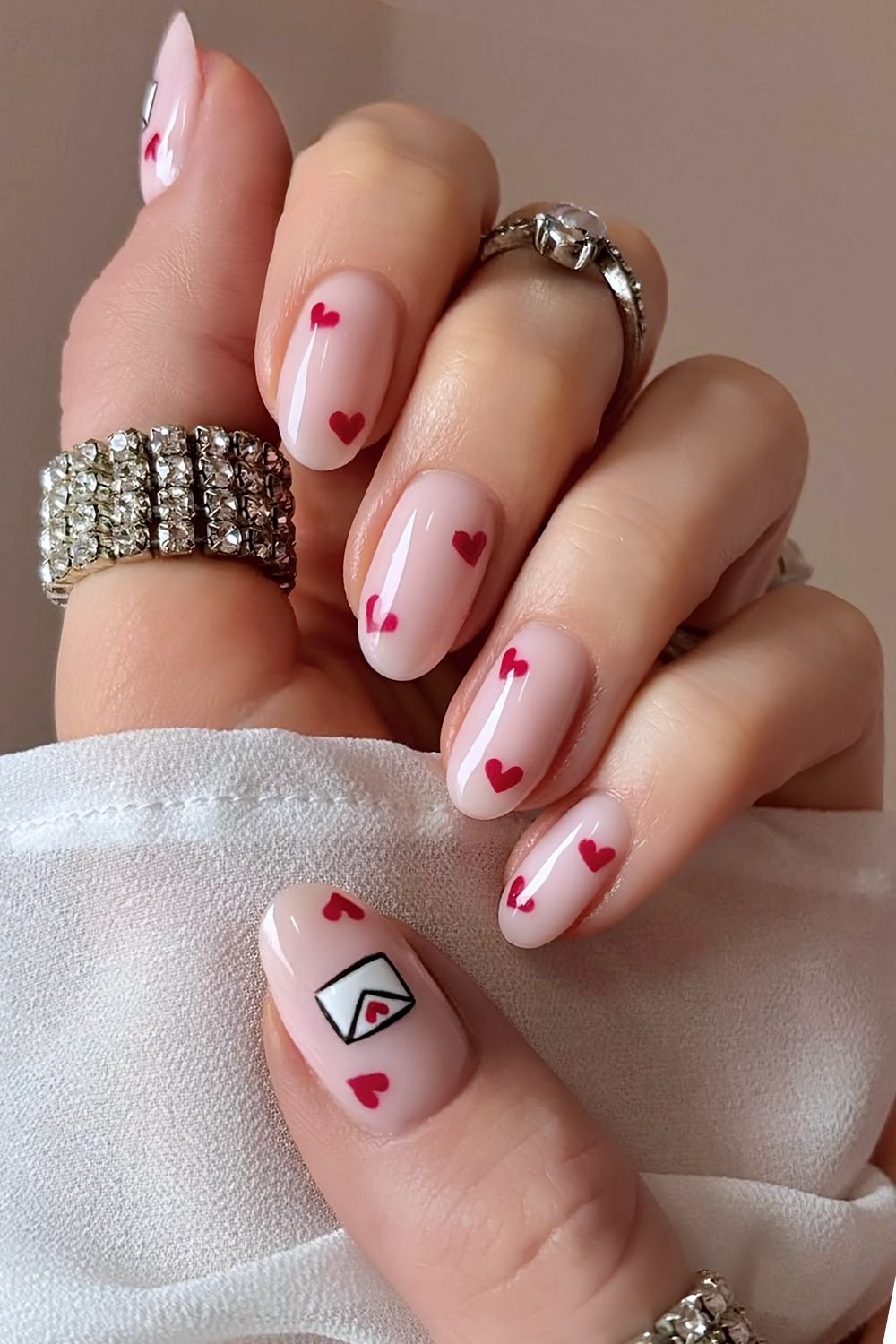Milky nails with heart and love letter accents