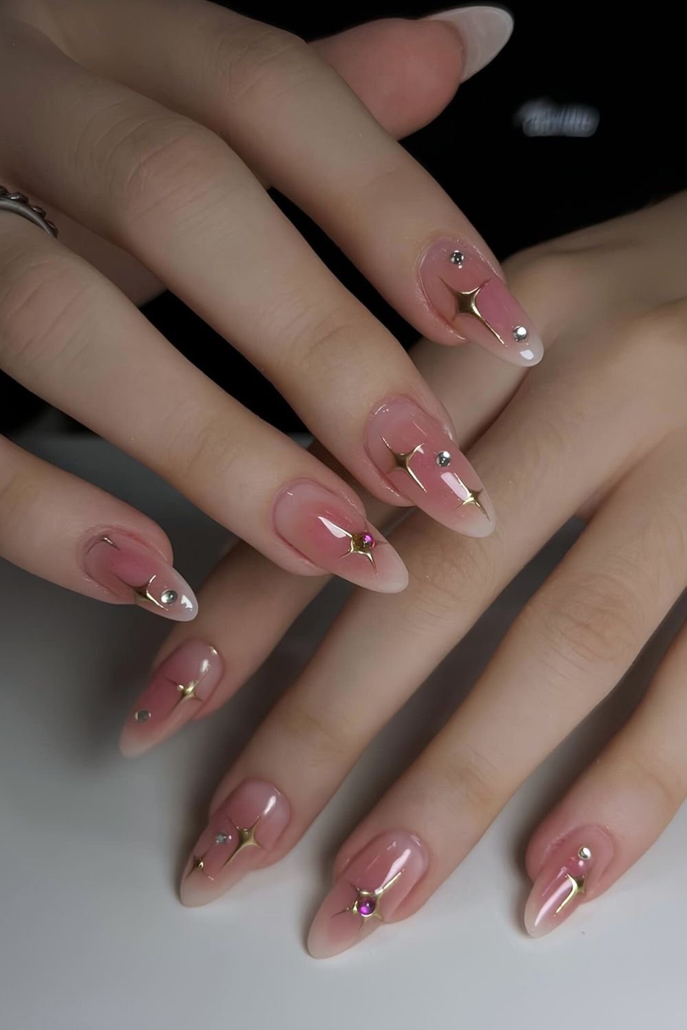 Pink aura nails with celestial design