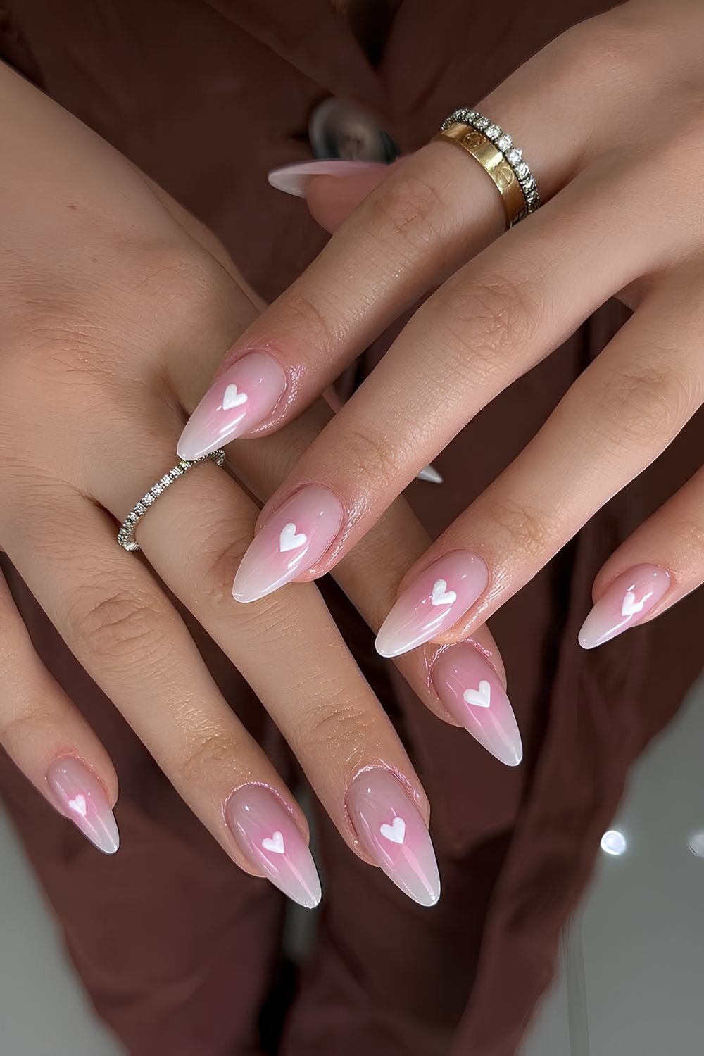 Pink aura nails with white hearts centered