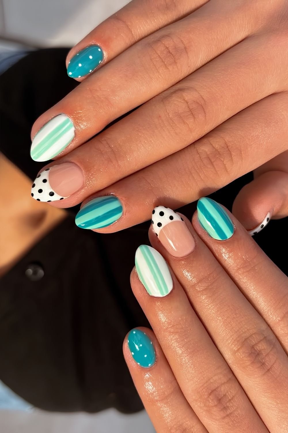 Polka dot and stripes nails in green and white