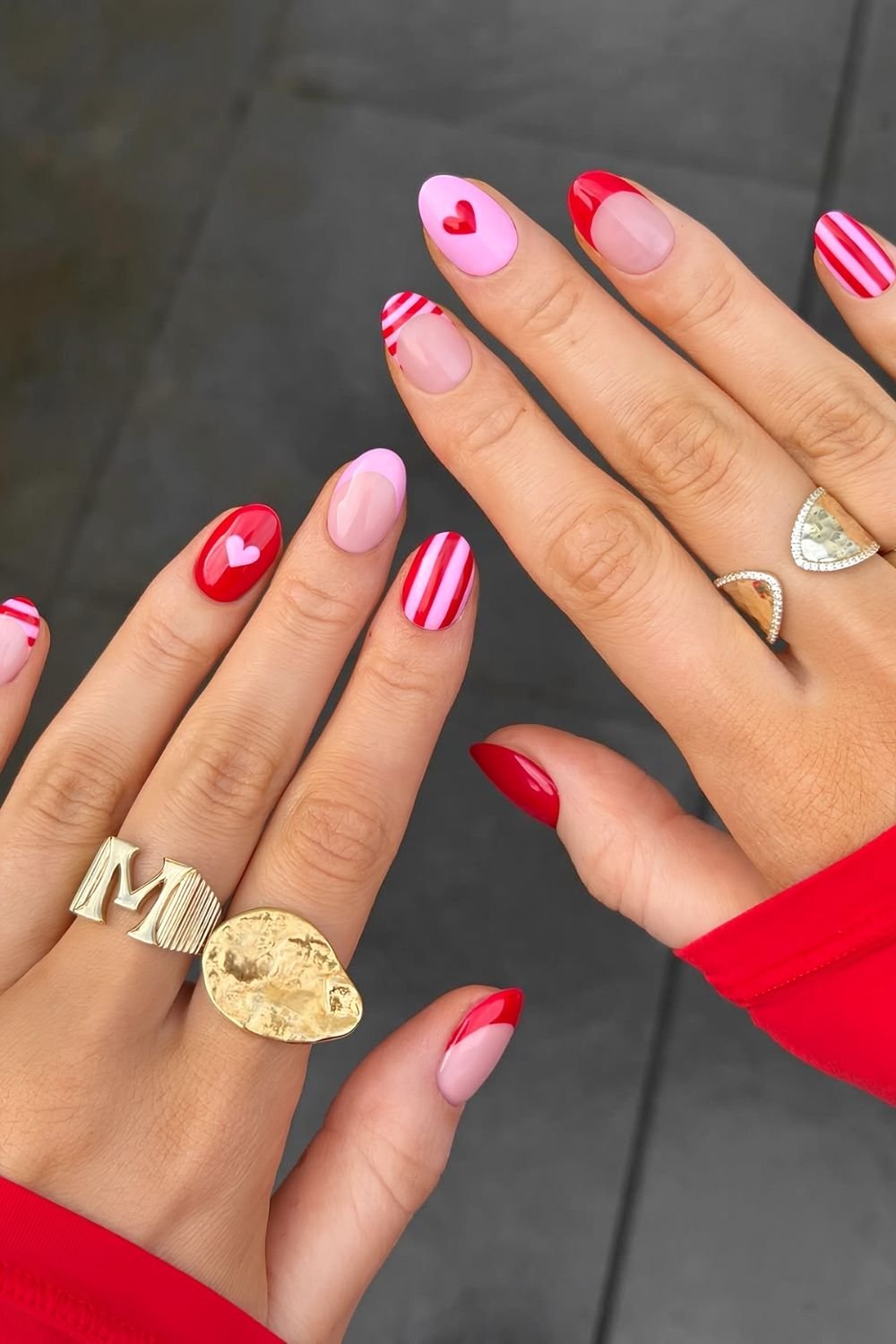 Red and pink stripe nails with hearts