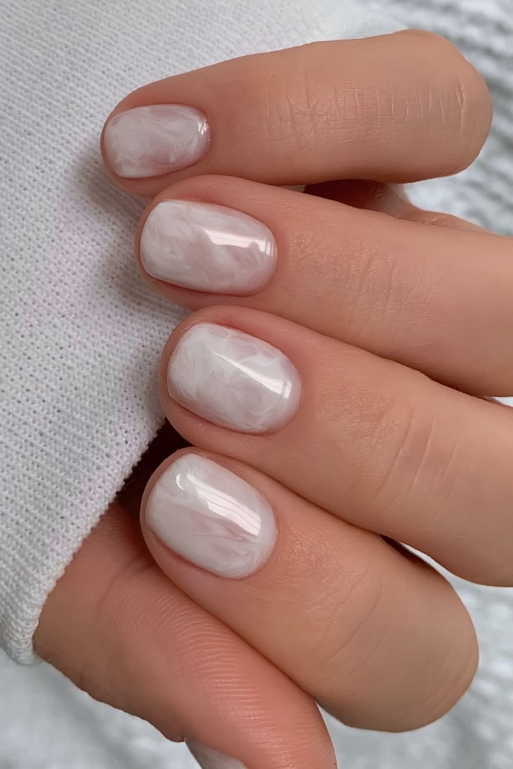 Short milky white marble nails