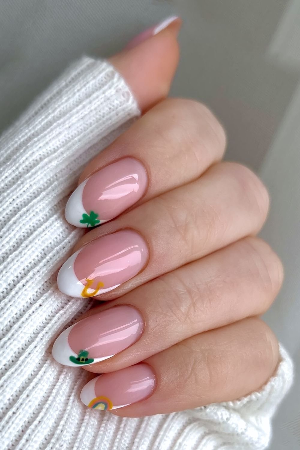 White French tip nails with St Patricks day nail art