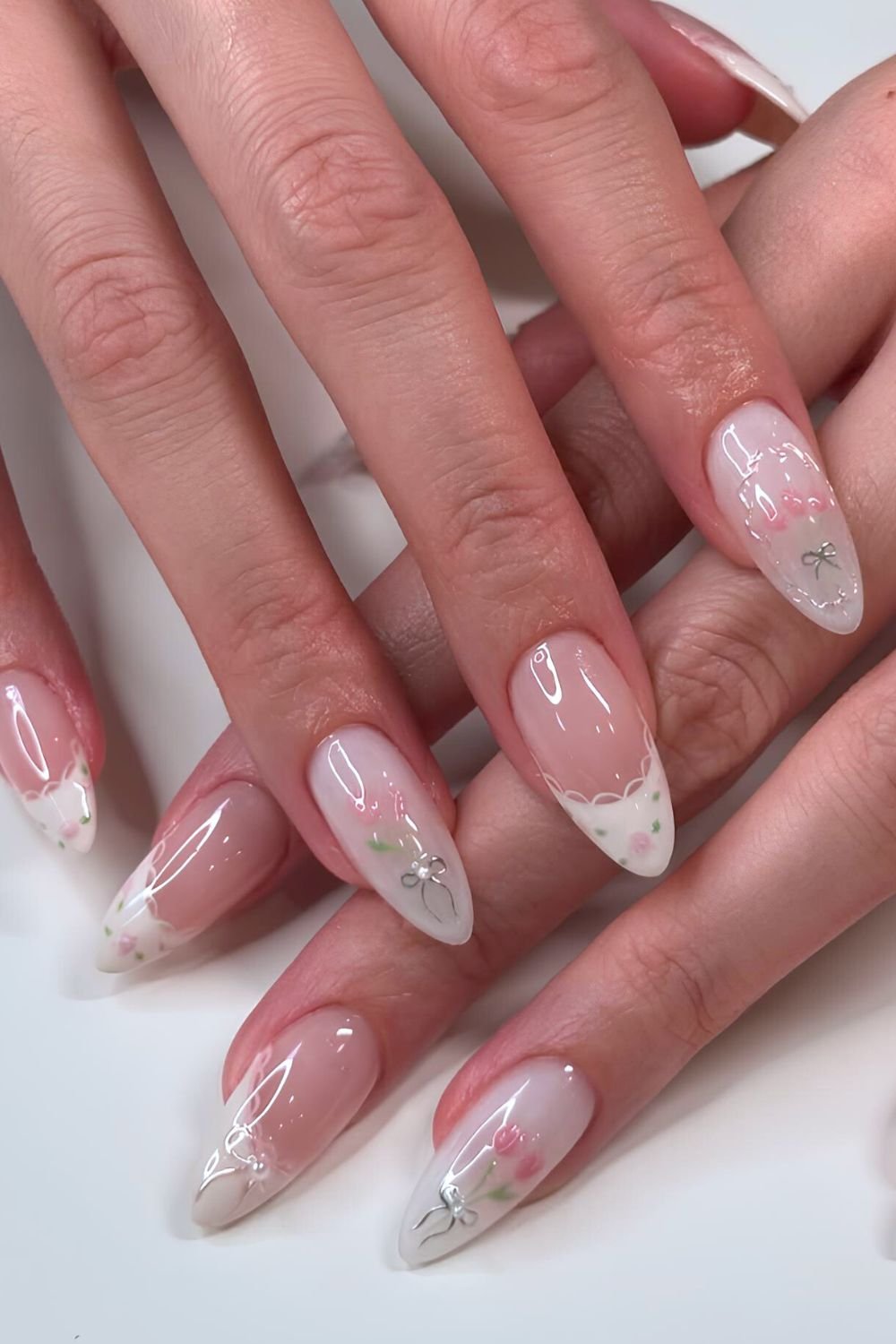 White french tips with lace outllines and tulip accents