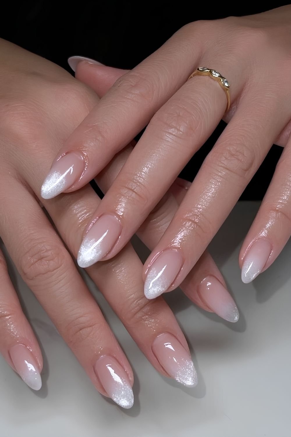 White ombre French mani with cat eye effect
