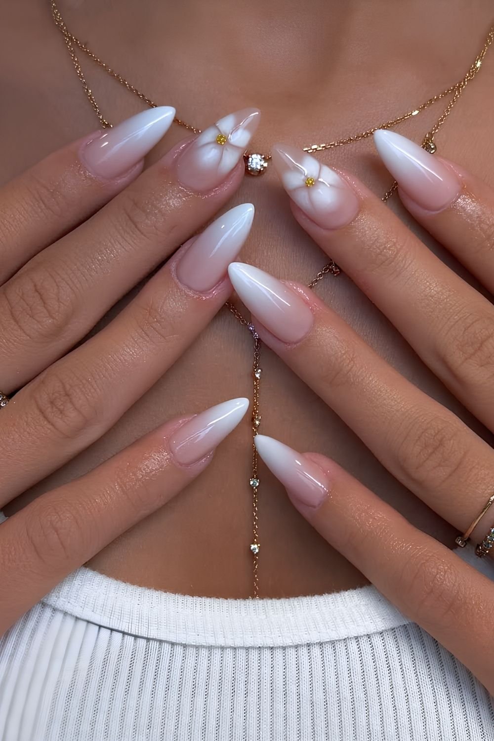 White ombre nails with blooming flower details