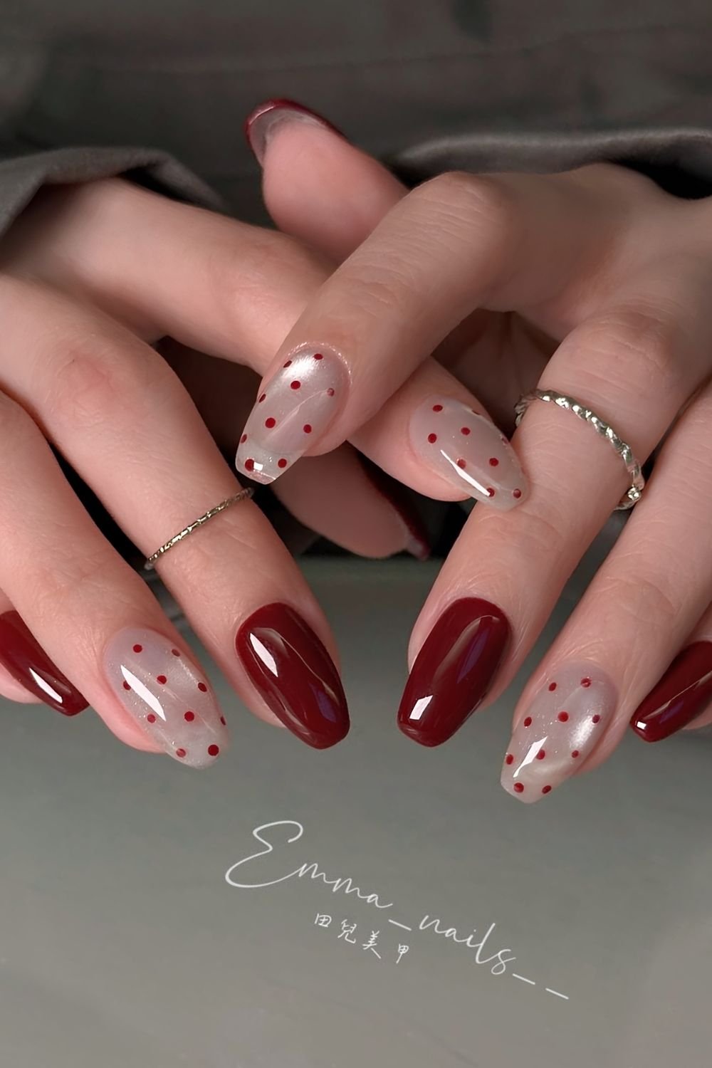 White polka dot cat eye and red glossy nail combo