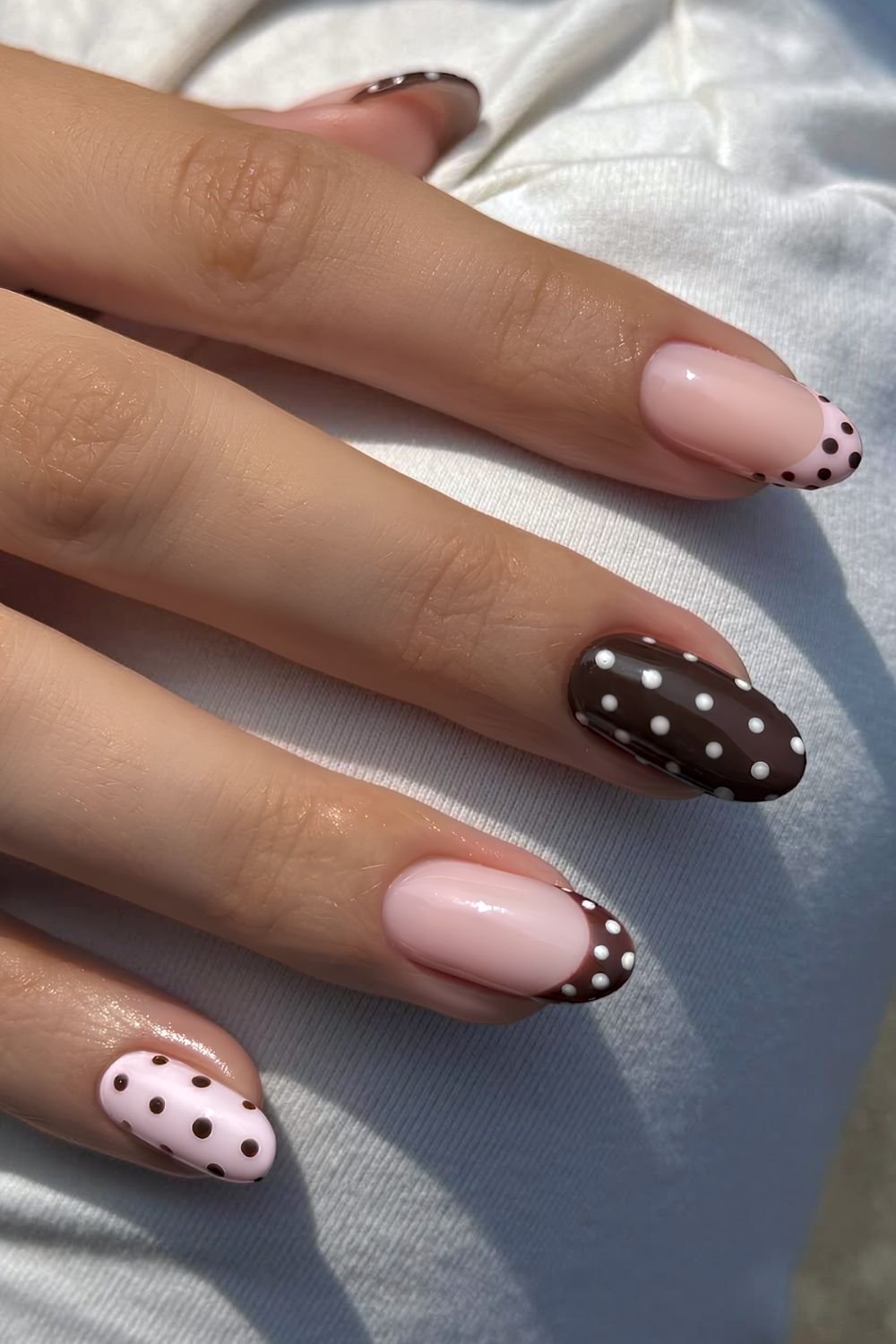 Brown and baby pink polka dot BIAB mani
