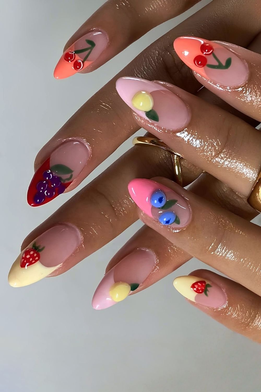 Colorful pastel French tips with fruit accents