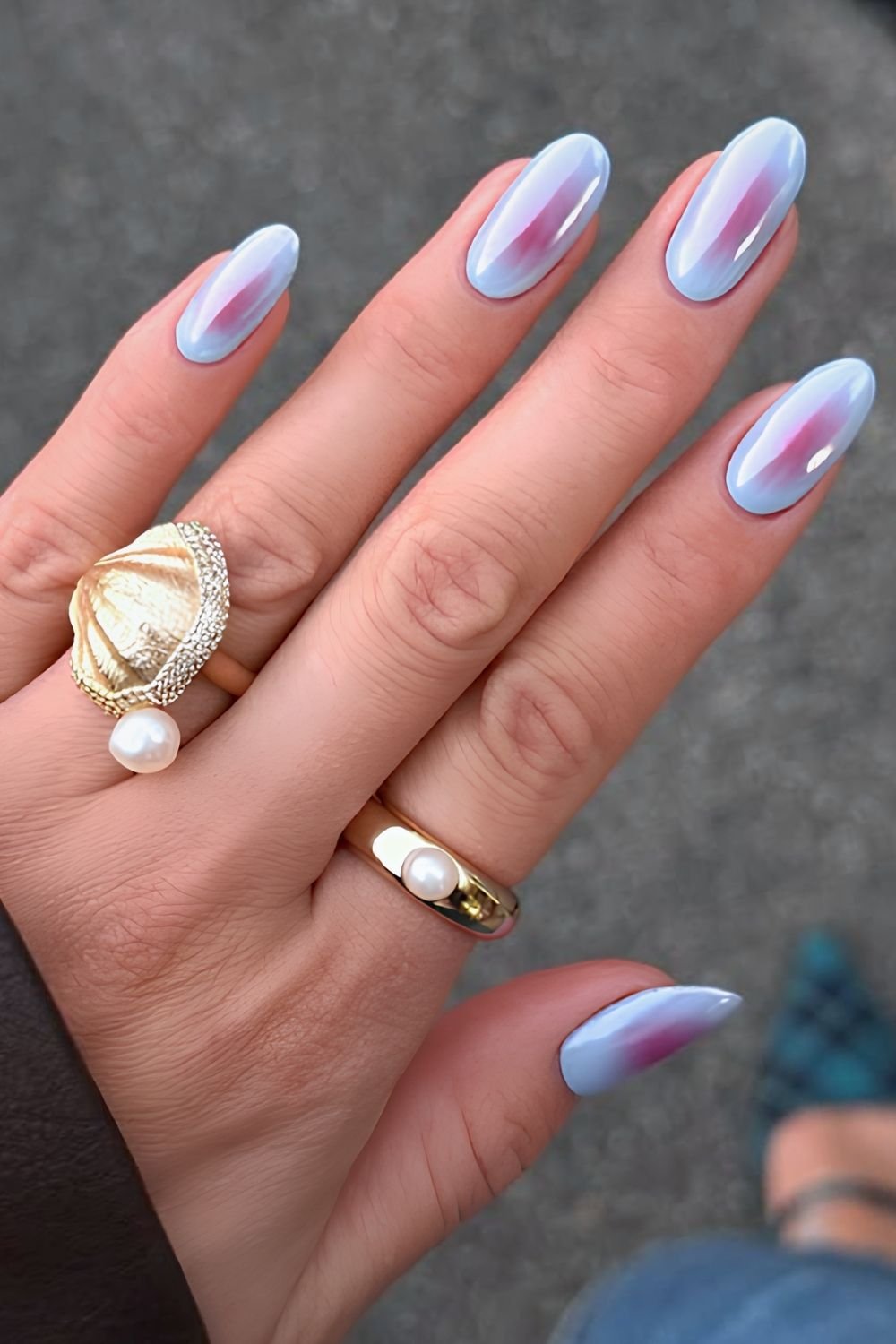 Glazed light blue and pink aura nails