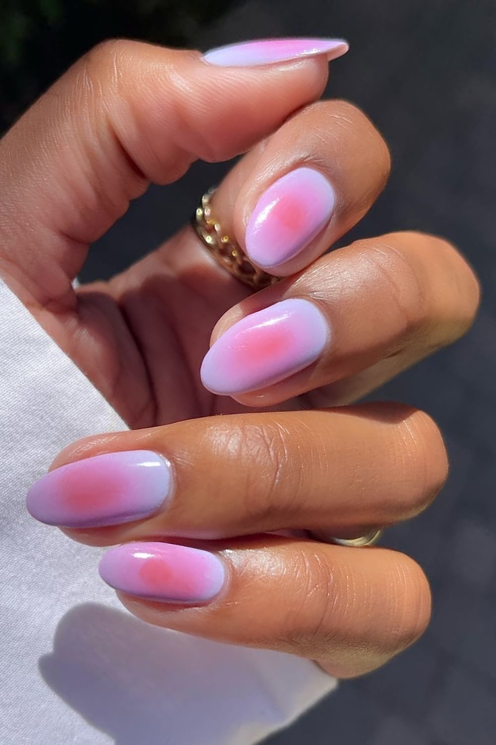 Lavender nails with pink aura halos
