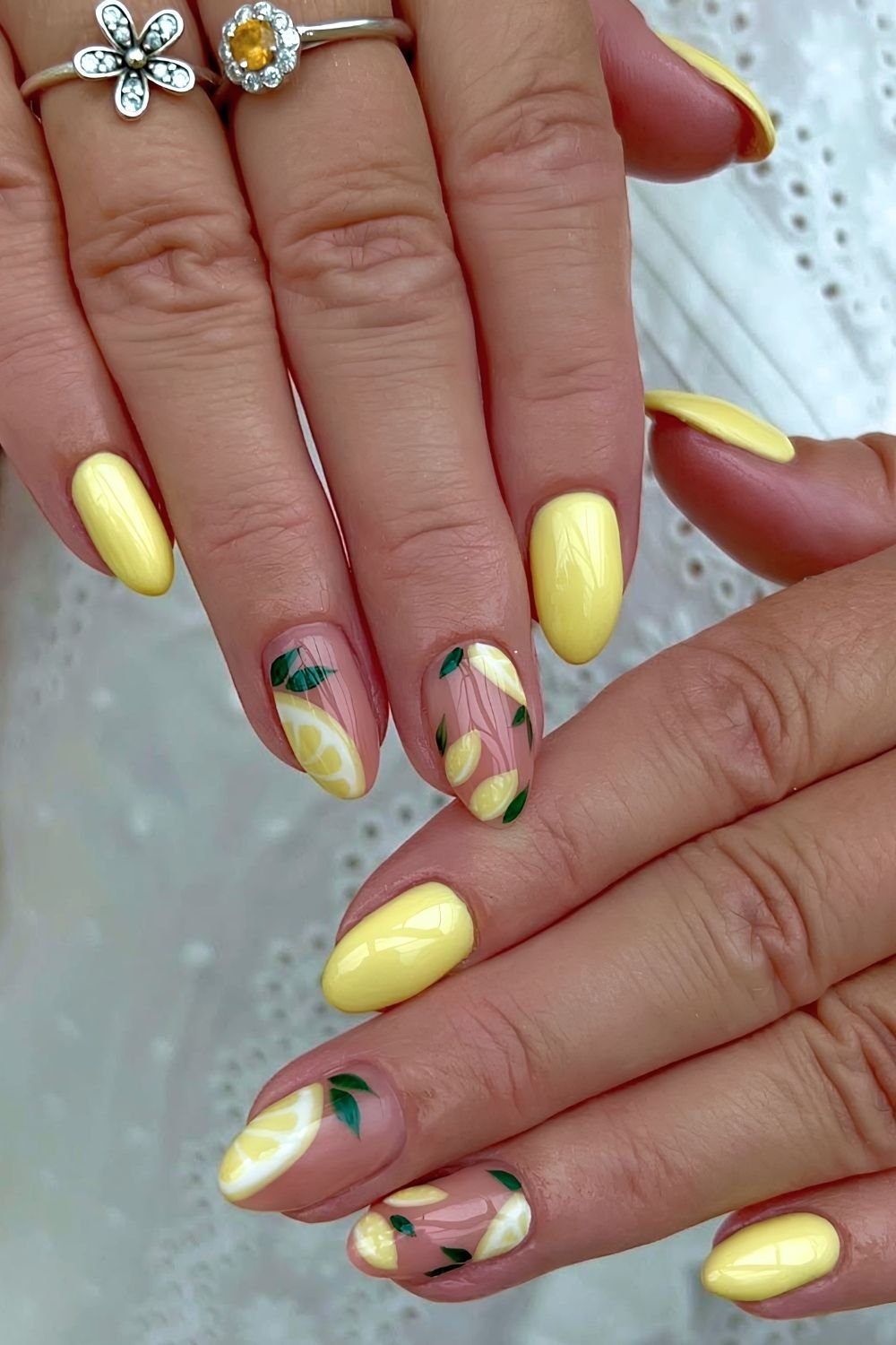 Lemon yellow nails with lemon slices nail art