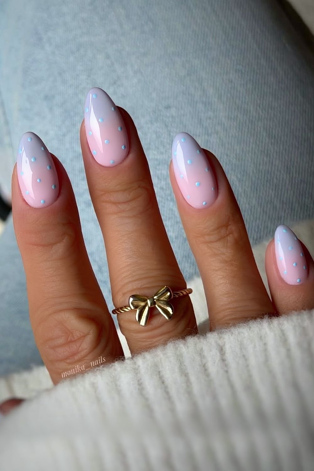 Light blue ombre French tip nails with polka dots