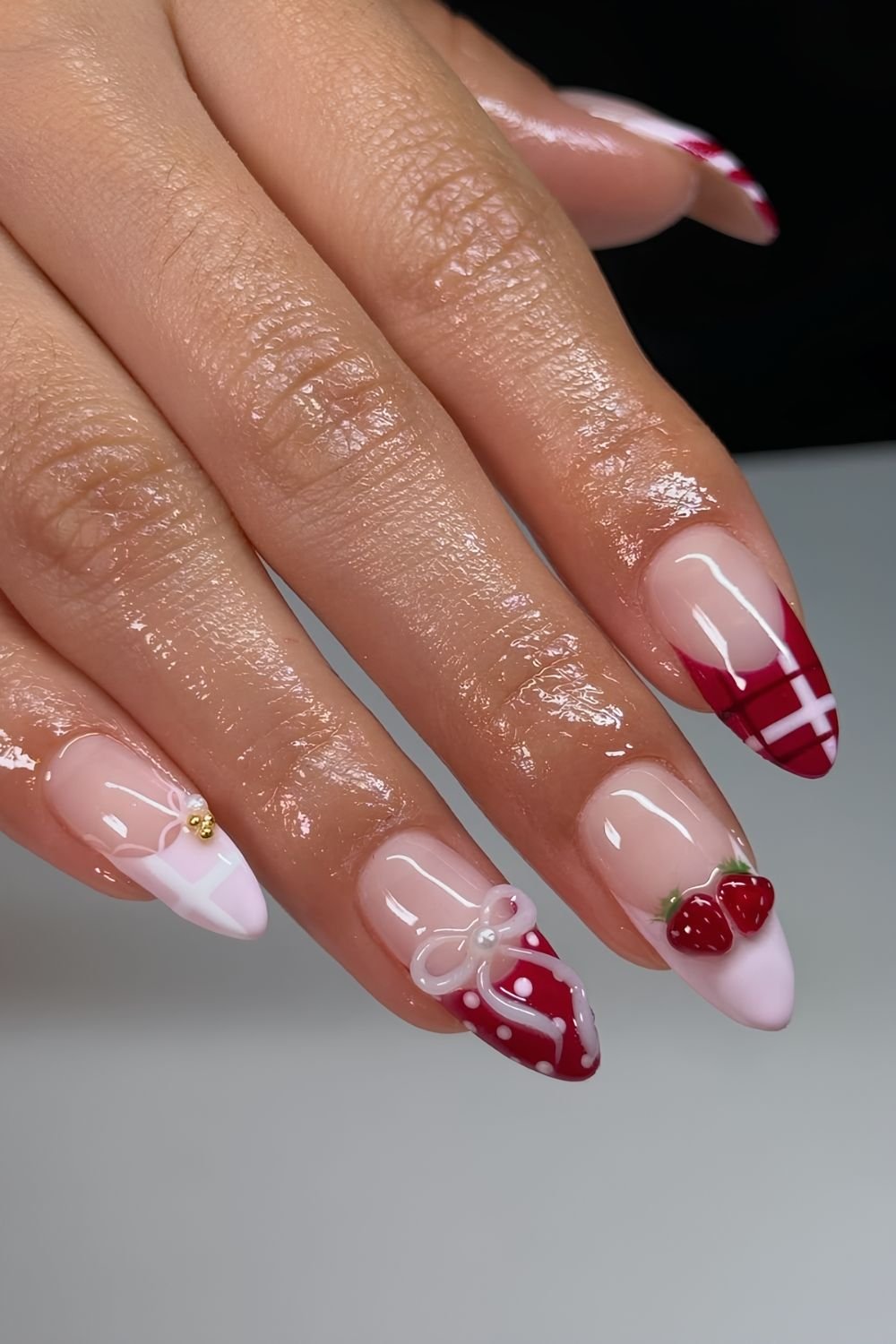 Light pink and cherry red tips with 3D strawberries and bows