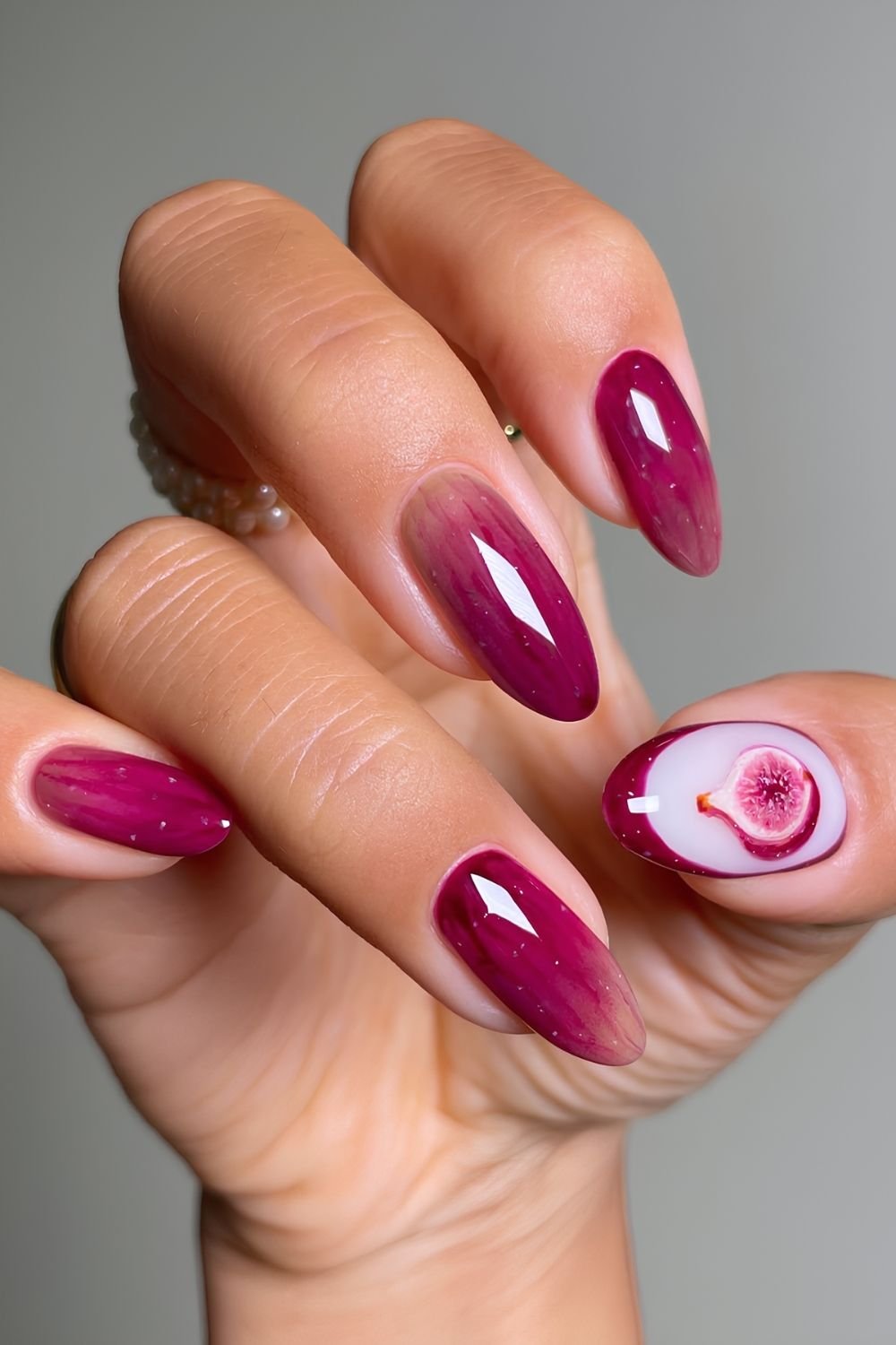 Magenta purple nails with fig accent nails