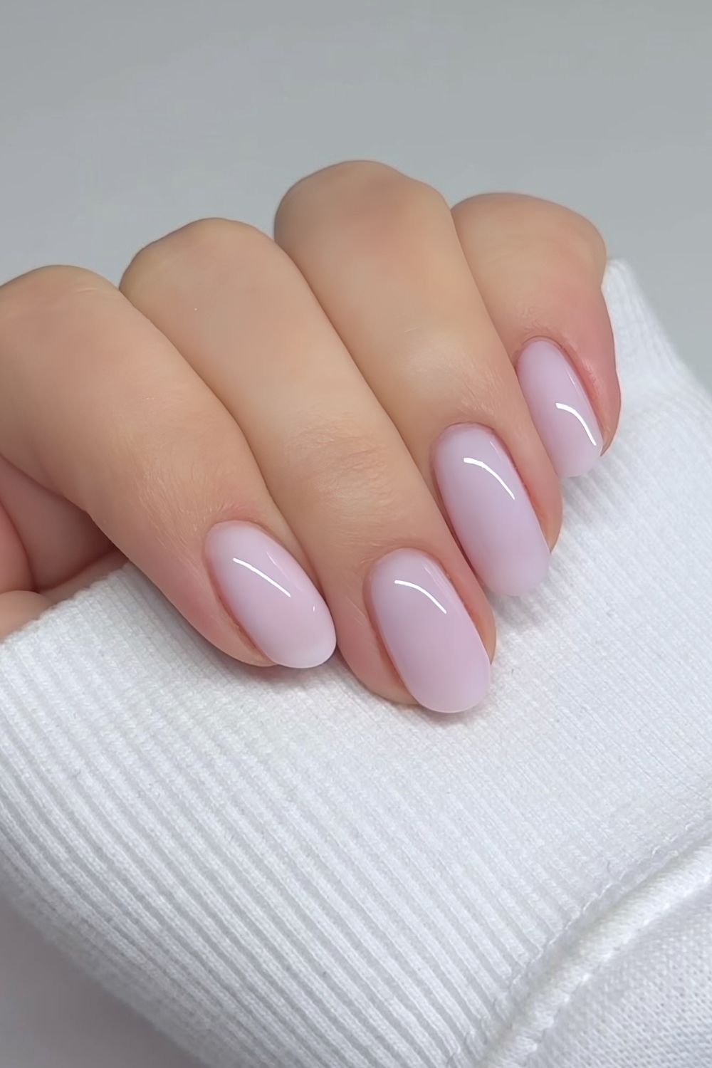 Milky lilac BIAB manicure