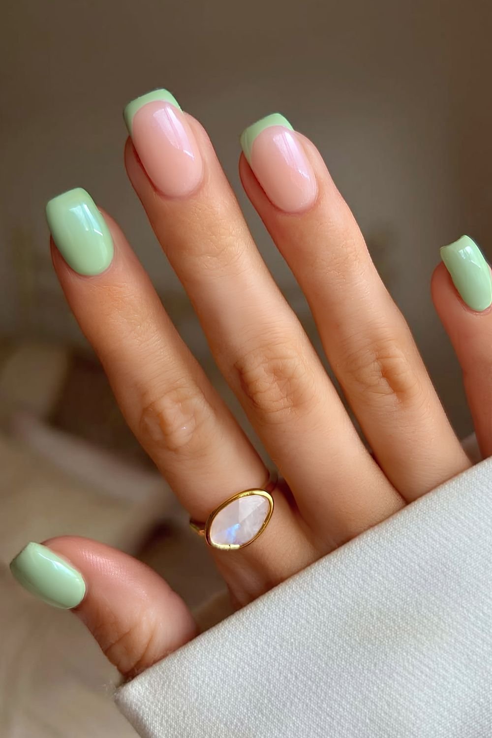 Mint green nails with accent french tips