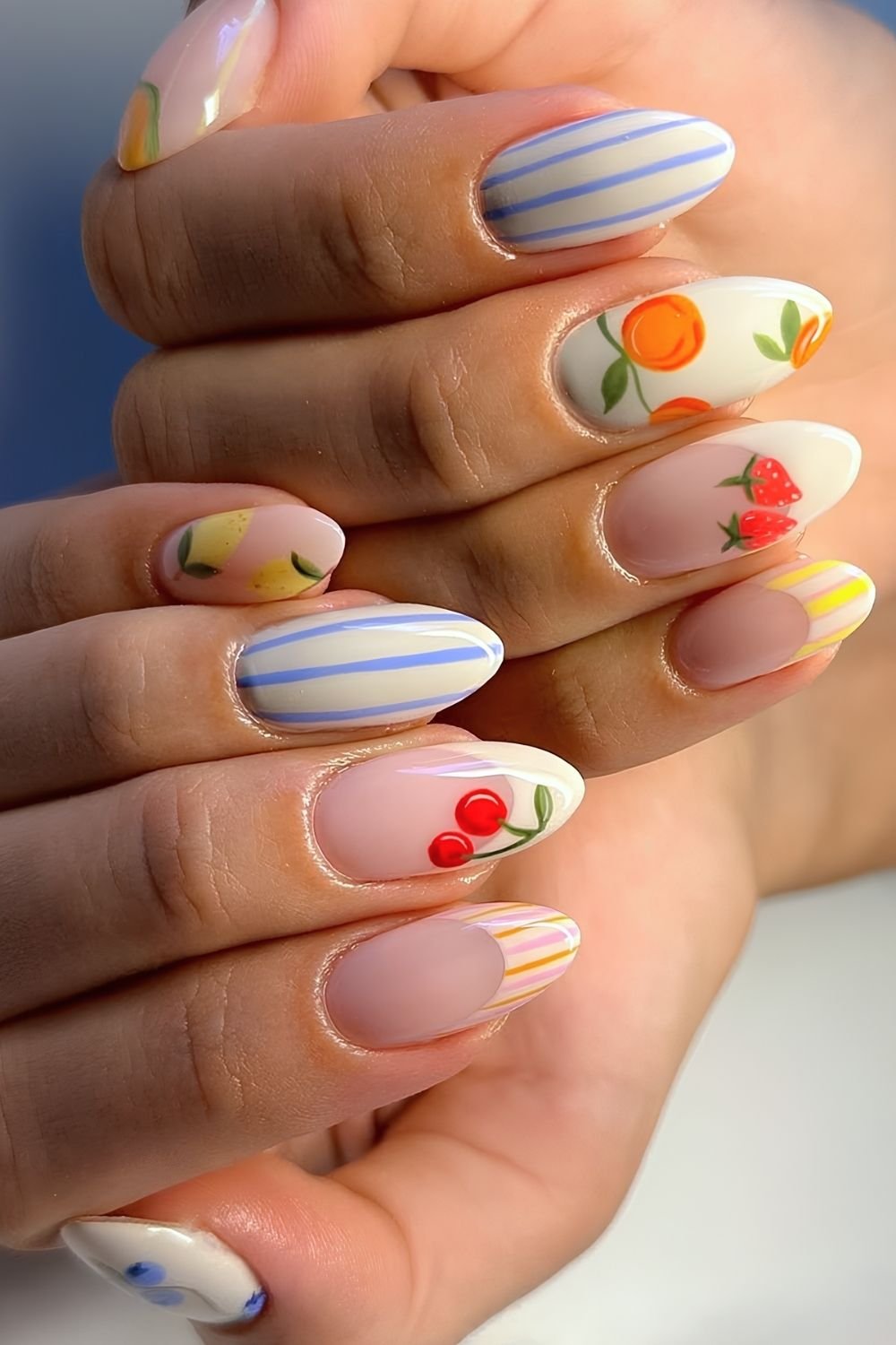 Mix and match stripes and fruit nails