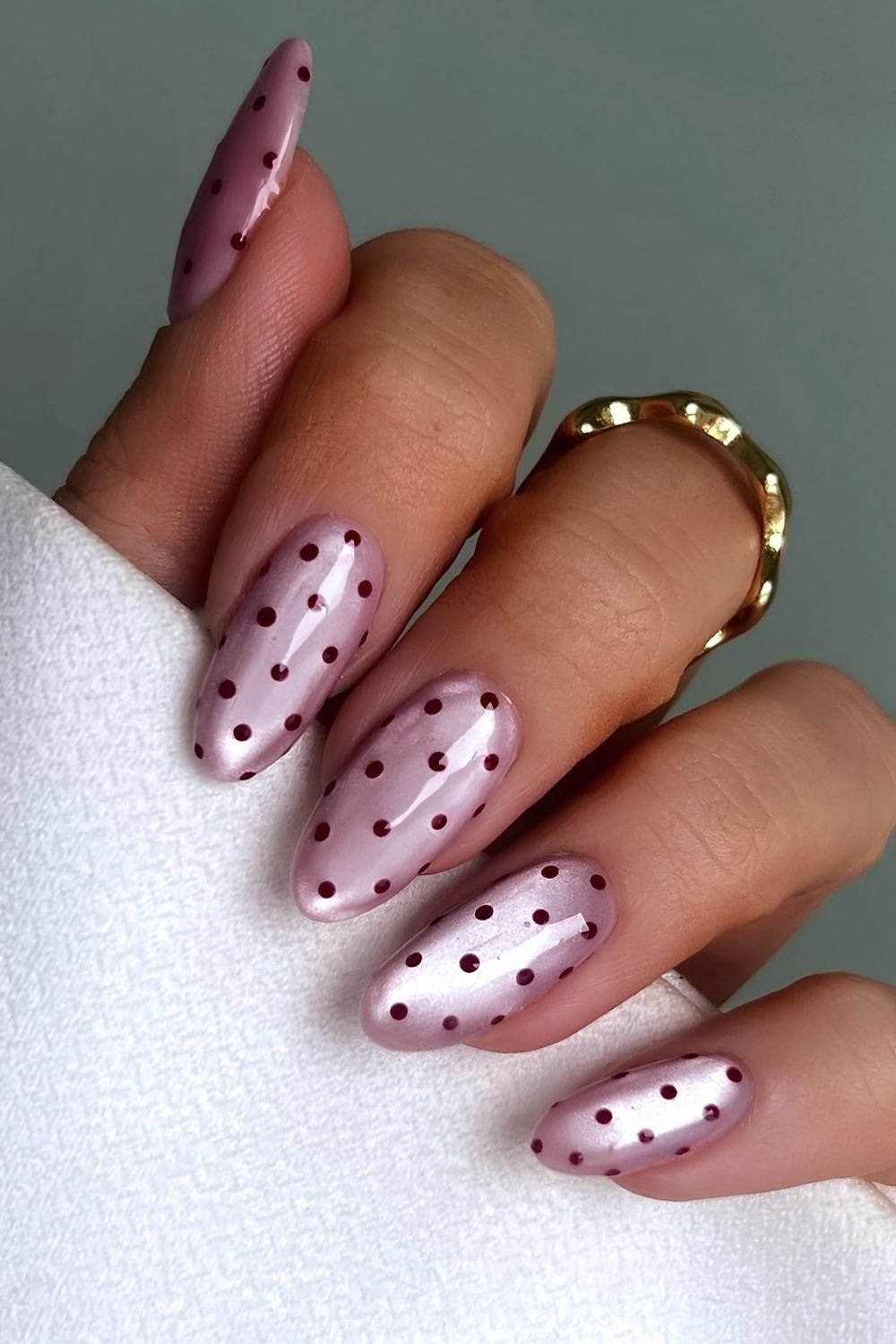 Pink glass nails with red polka dots