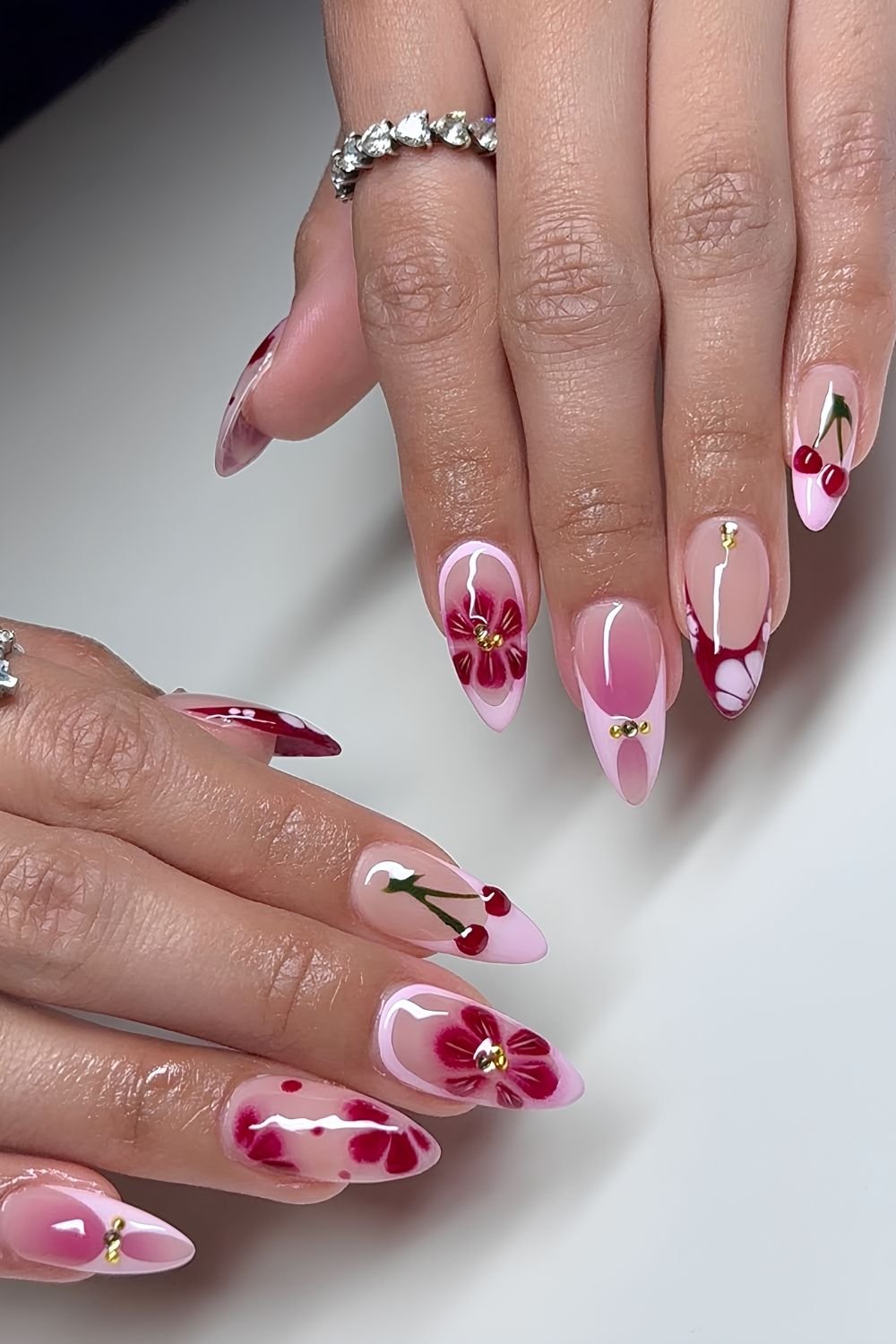 Red and pink mix and match floral nails
