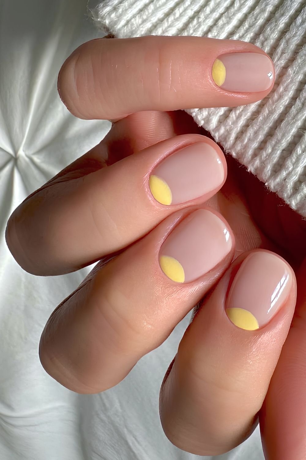 Short milky white nails with lemon jellow halfmoons