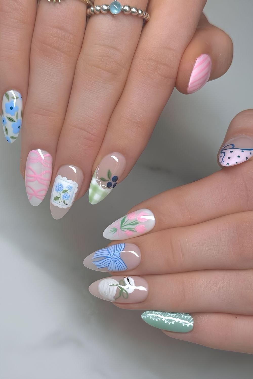 Spring mix and match nails with gingham, bows, swan and florals