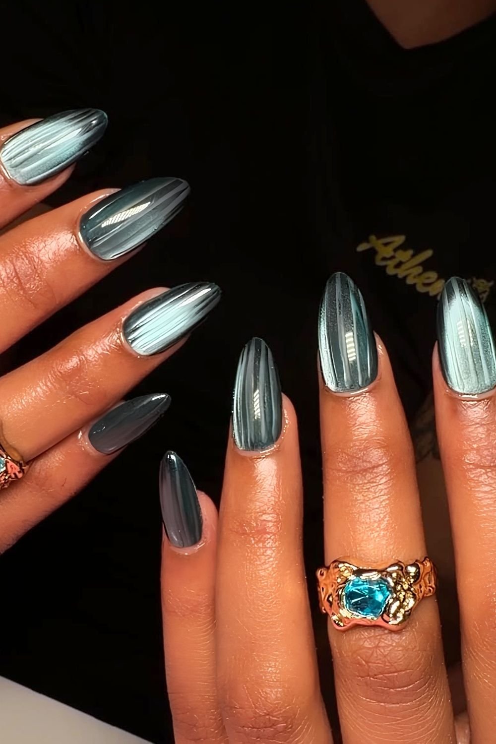 Turquoise ribbed glass manicure