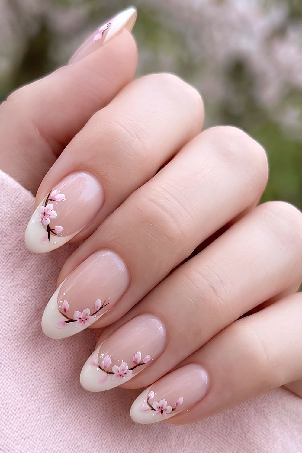 Beige French tips with cherry blossom outline nail art