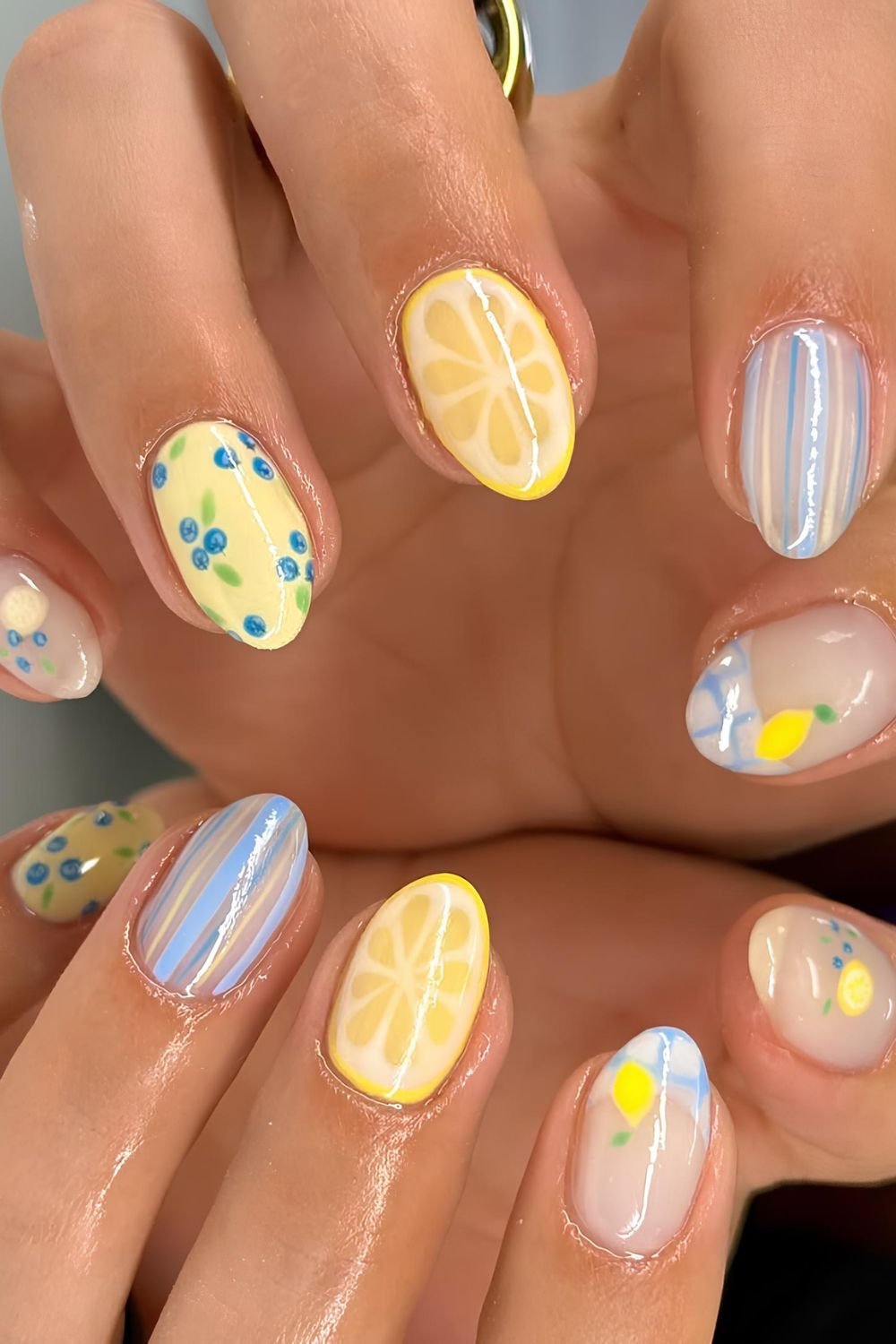 Blueberry and lemon nails with stripes and gingham pattern accents