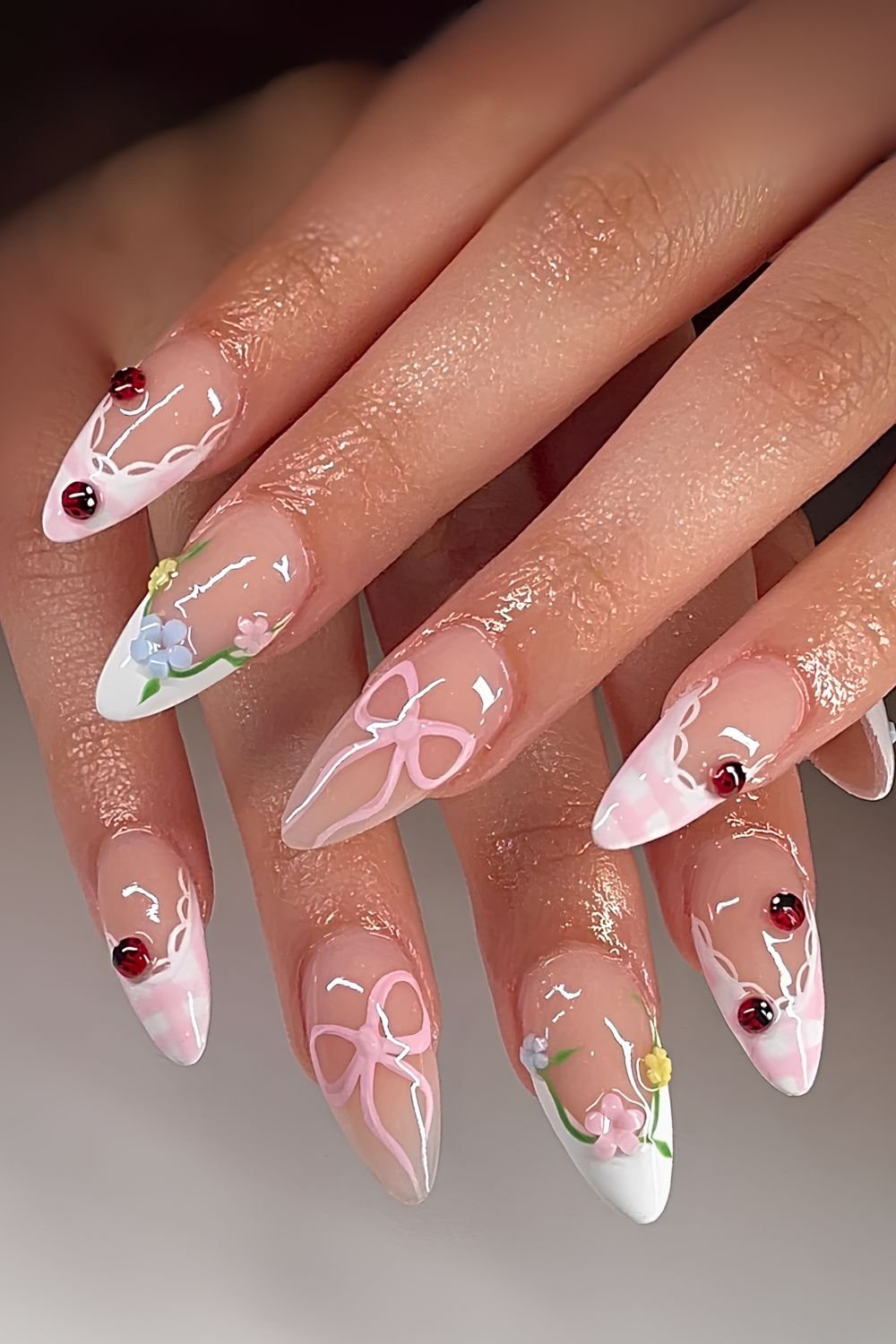 Coquette French tips with 3d ladybug, lace, bow and floral accents