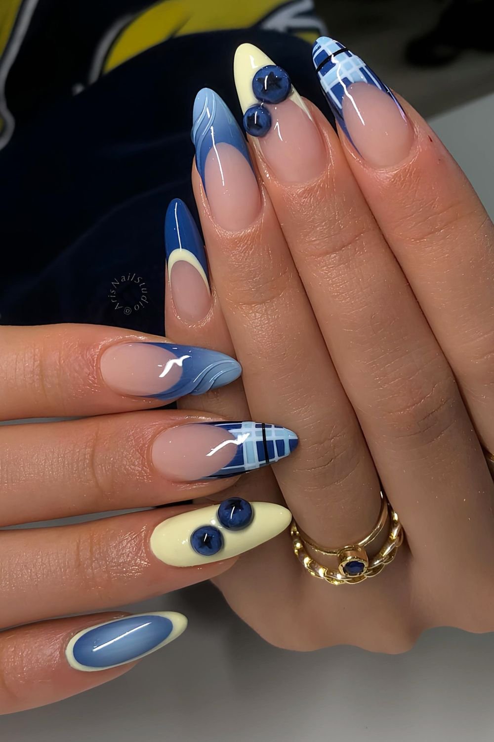 Dark blue and butter yellow nails with 3D blueberries