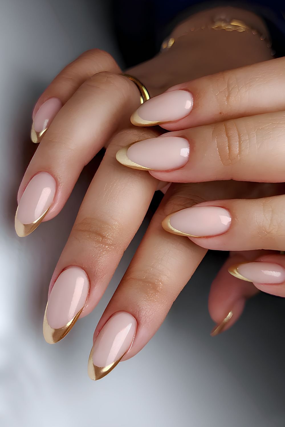 Golden chrome French tip nails