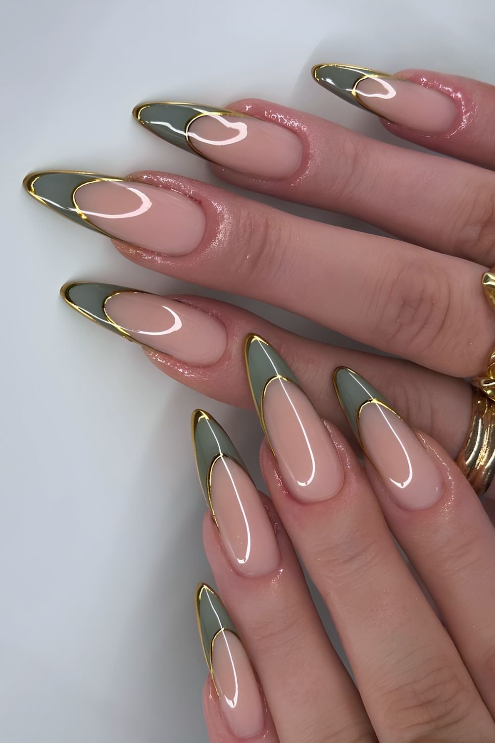 Green double French manicure with gold outline