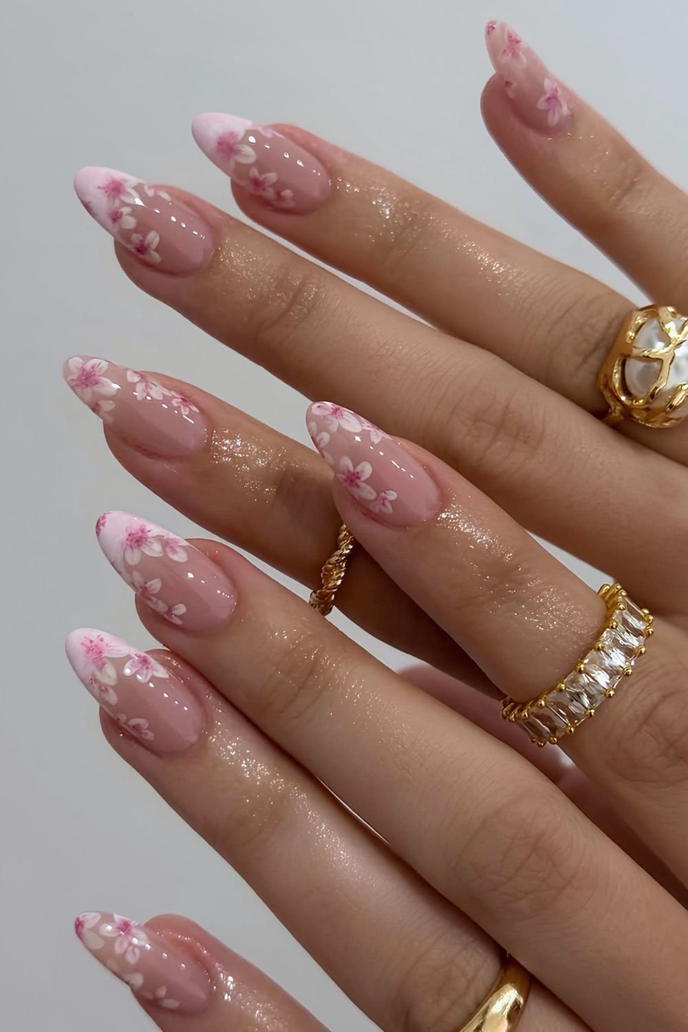 Light pink french tips with cherry blossom floral design