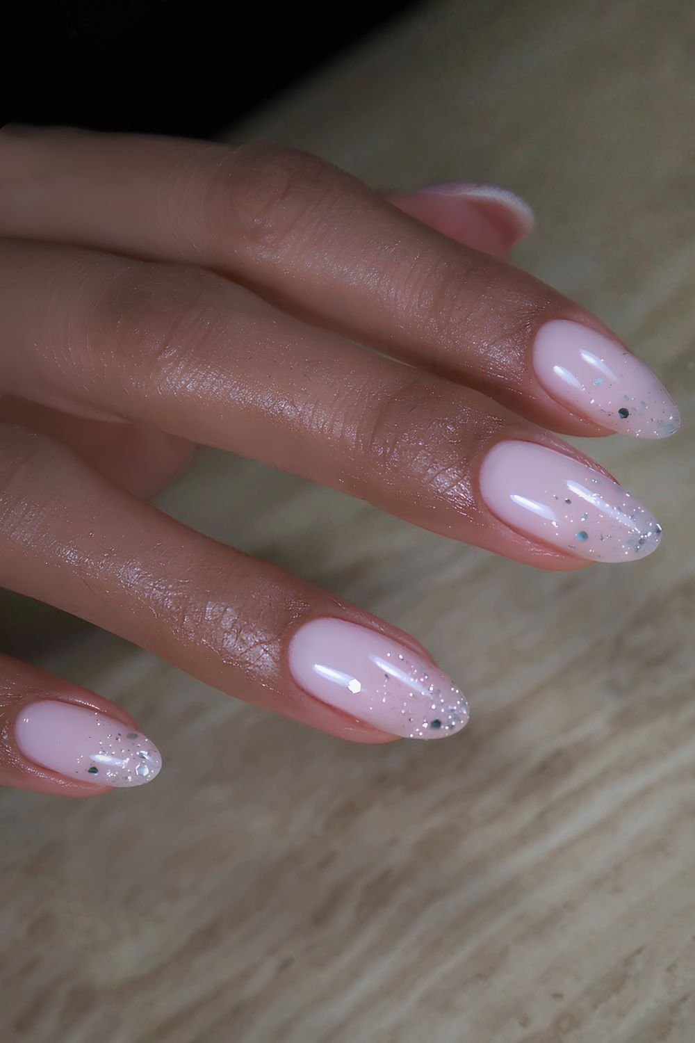 Milky pink nails with silver glitter ombre French tips