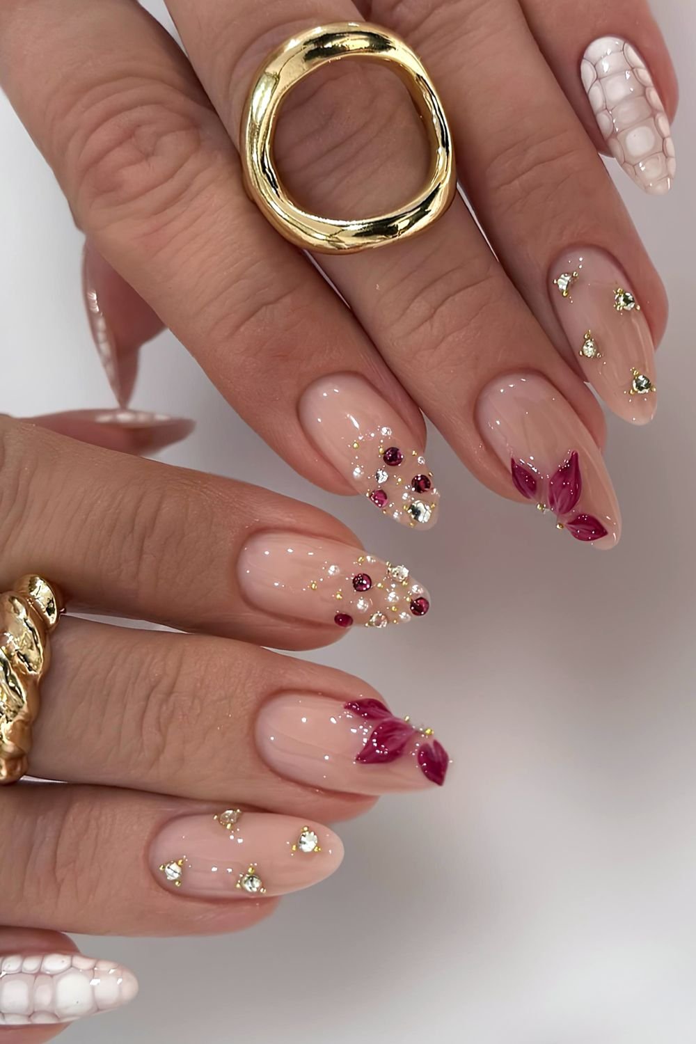 Mix and match floral and gem nails