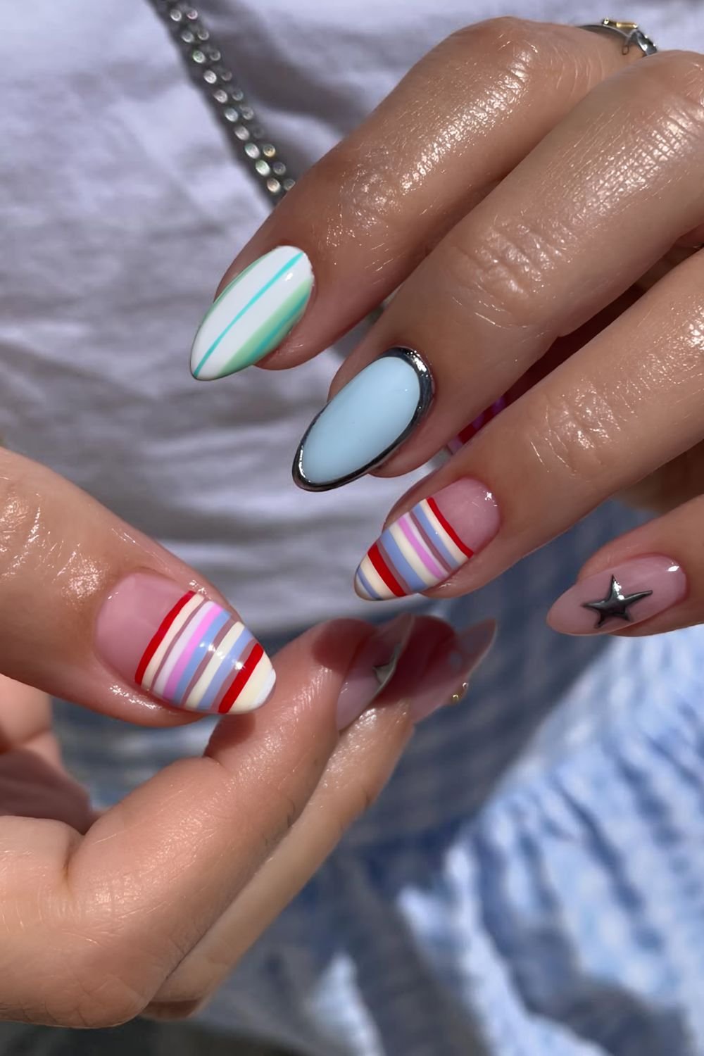 Mix and match stripes and silver chrome nails