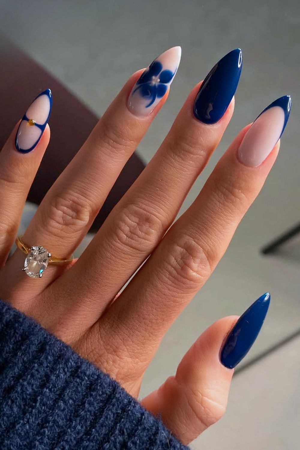 Navy blue nails with blooming gel floral accent