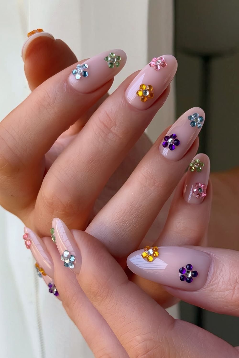 Nutral nails witg floral gems