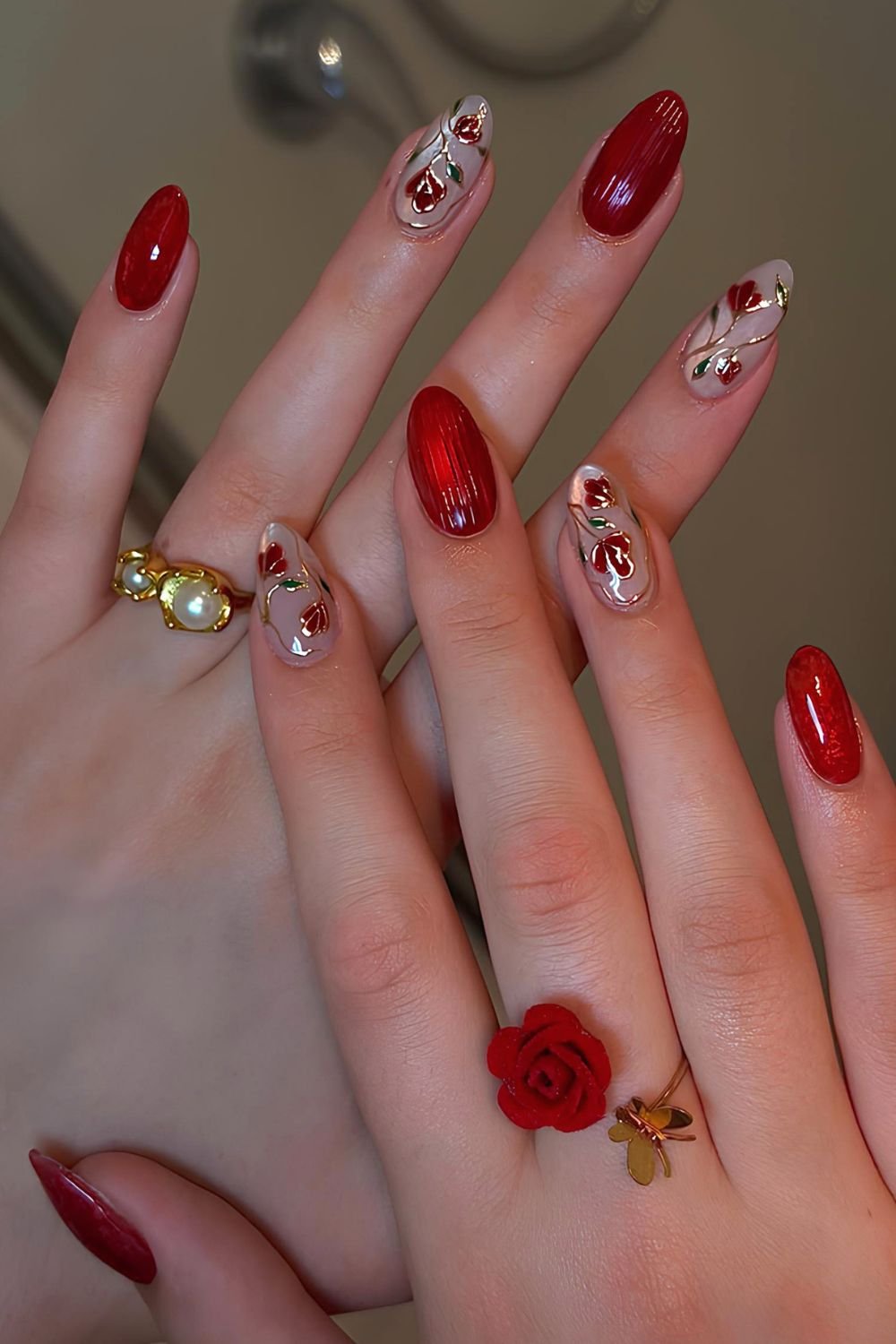 Red ribbed glass nails with red carnation accents