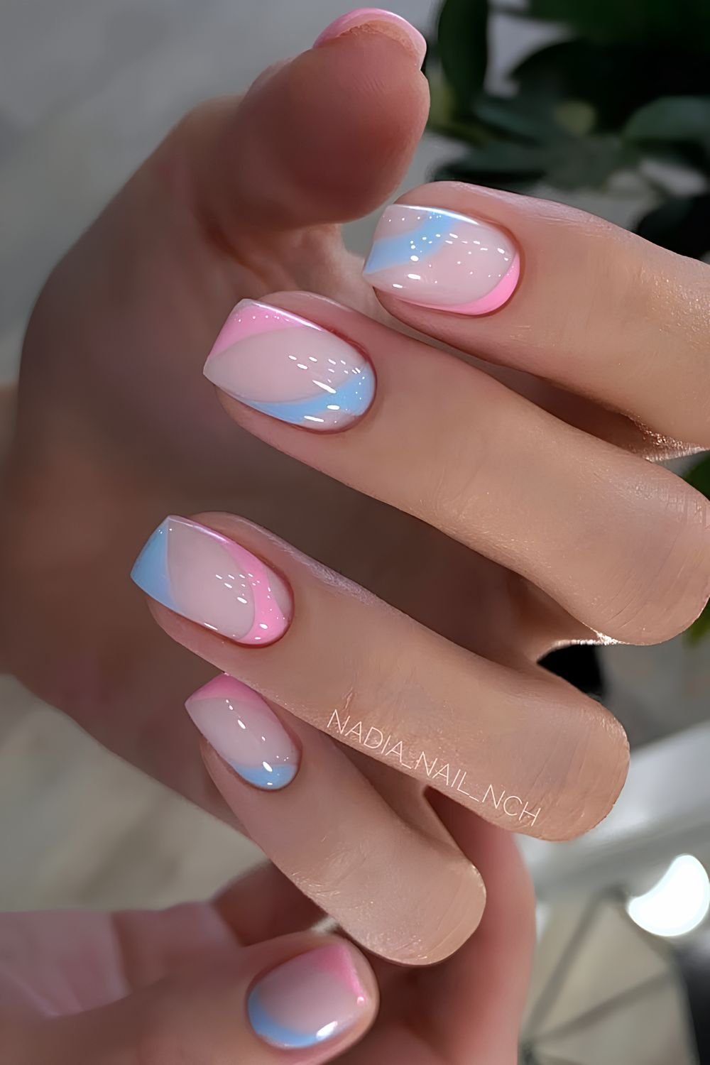 Soft blue and pink negative space nails