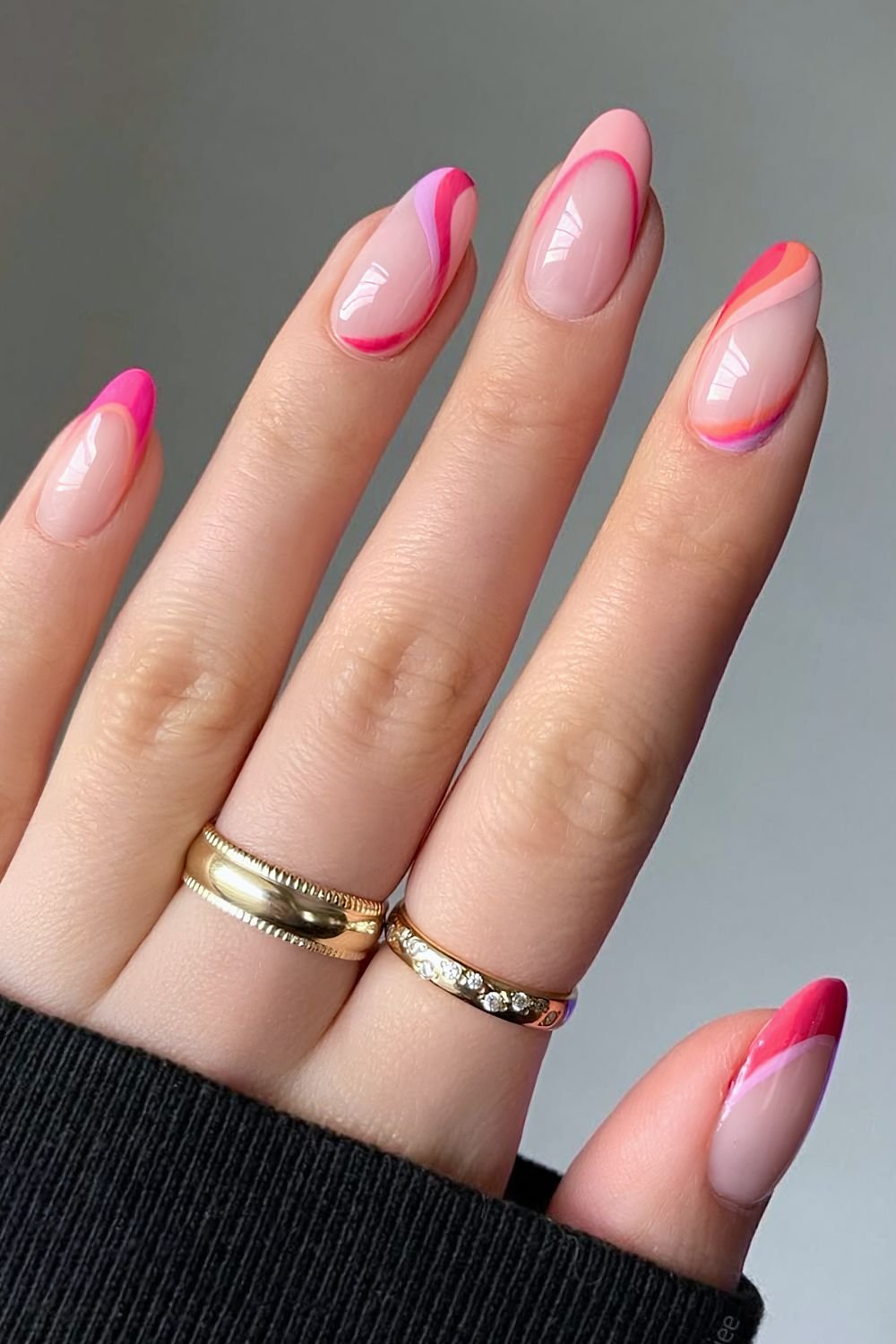 Swirly French nails in pink, peach and lilac shades