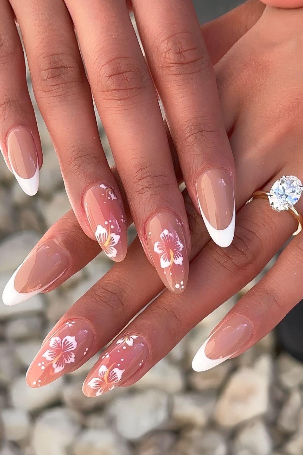 White French nails with hibiscus flower design